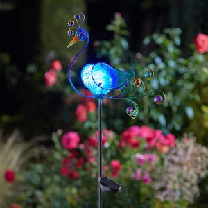 Peacock illuminating Solar Stake