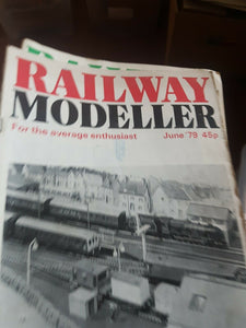 Railway modeller magazine June 1979 has pen on the cover.